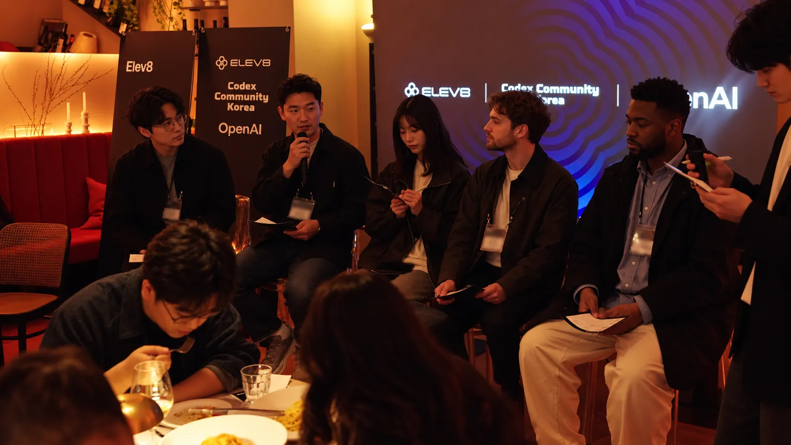 A panel at an Elev8 salon